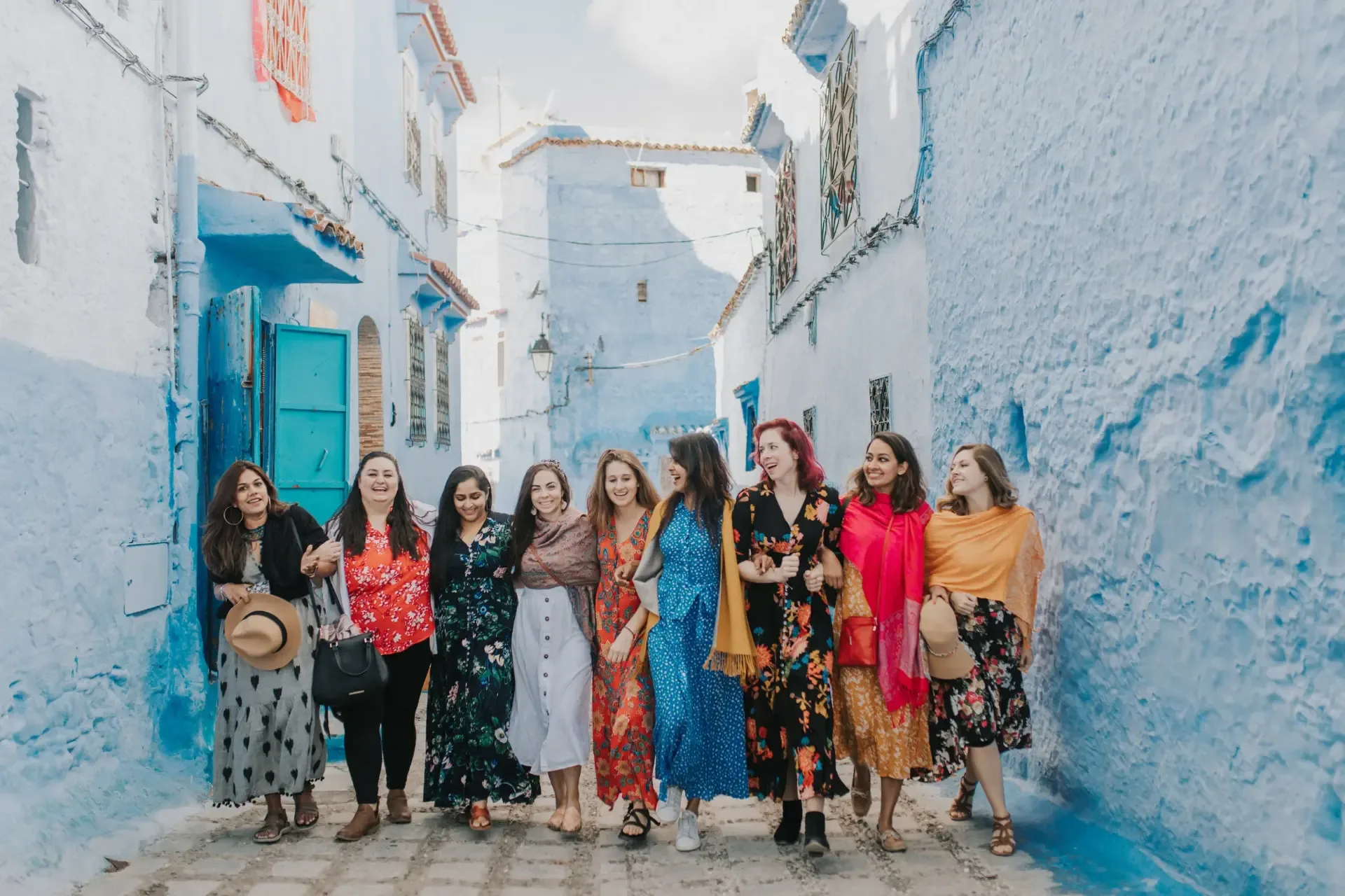 Student group in a blue-painted street of Chefchaouen